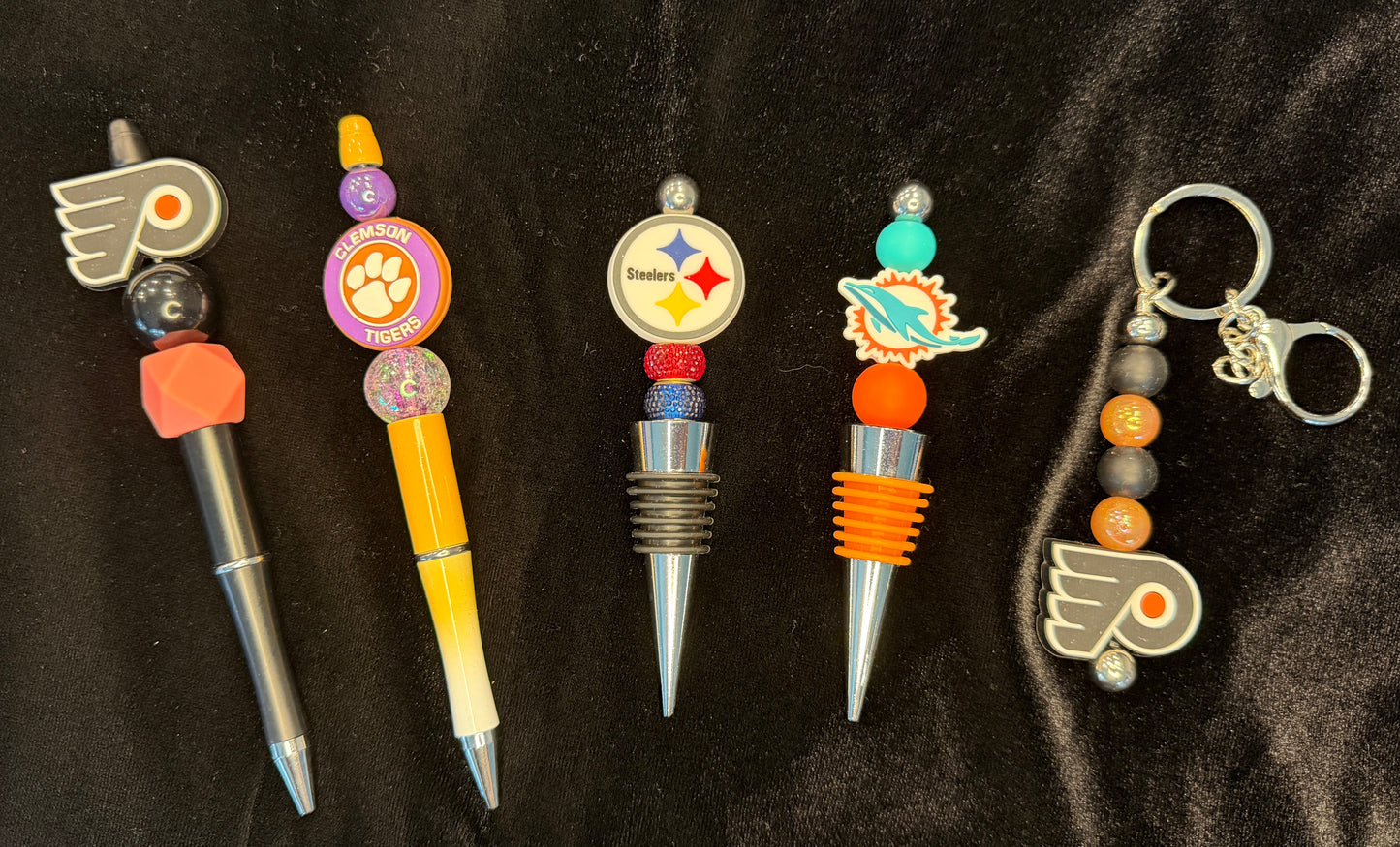 Sports pen, keychain, wine toppers